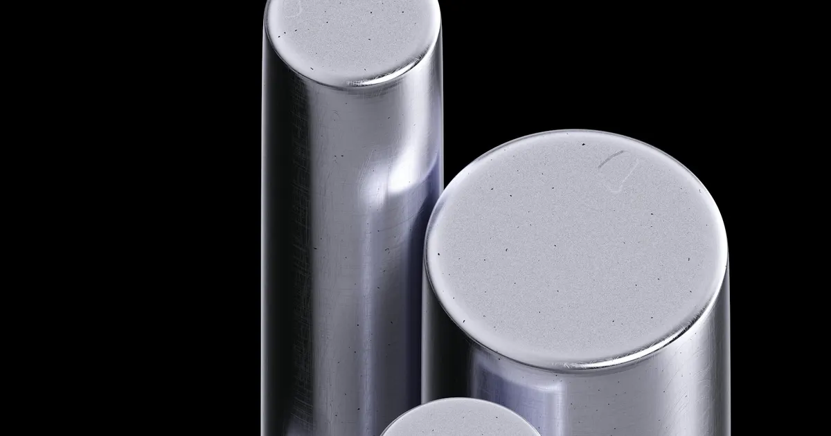 Polished round metal bar ends on a black background, bar stock of the kind bought by certificate when 316L VIM VAR is specified